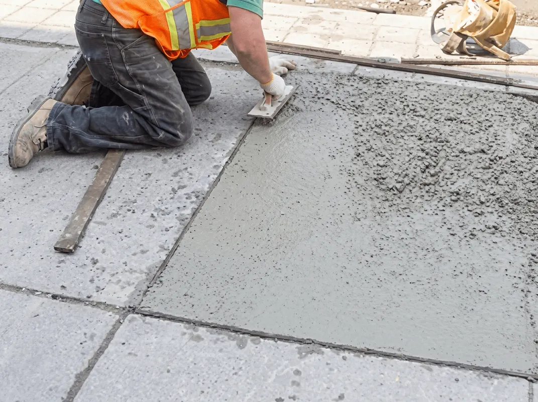 Professional repairing a concrete floor in Clearwater, FL